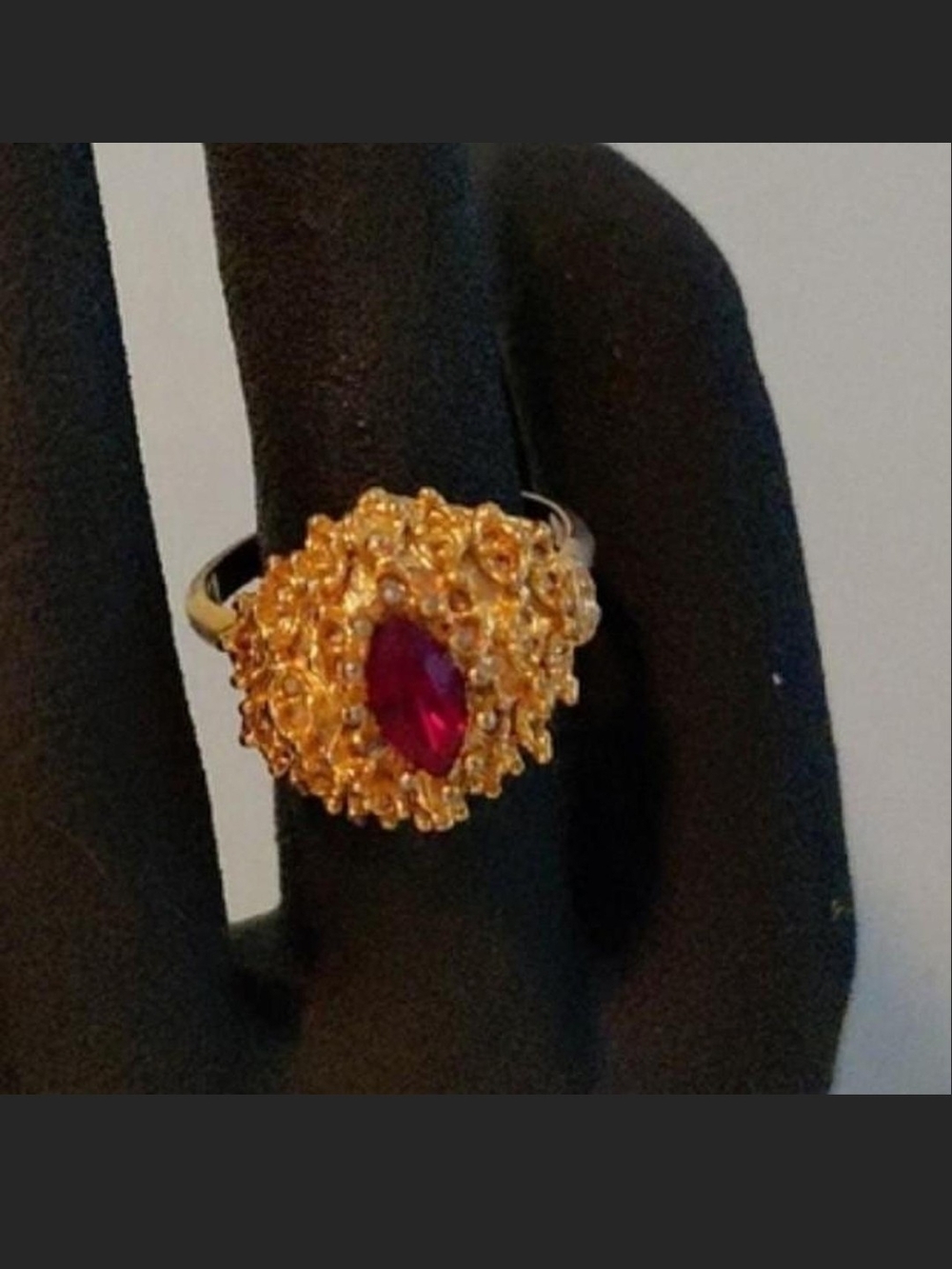 Vogue Gold-Tone Ring with Marquise Ruby-Red Stone
